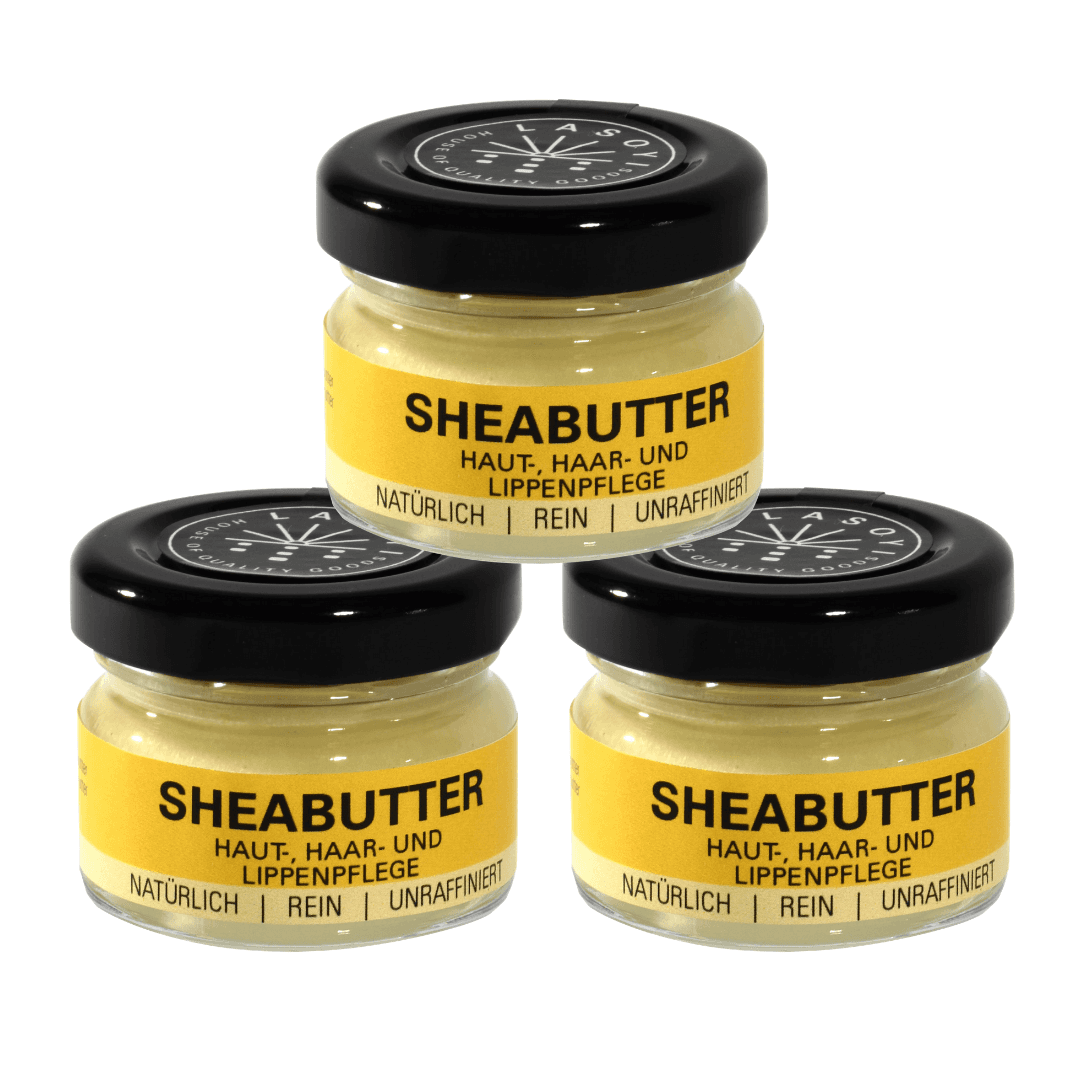 Drei Glastiegel mit Sheabutter
