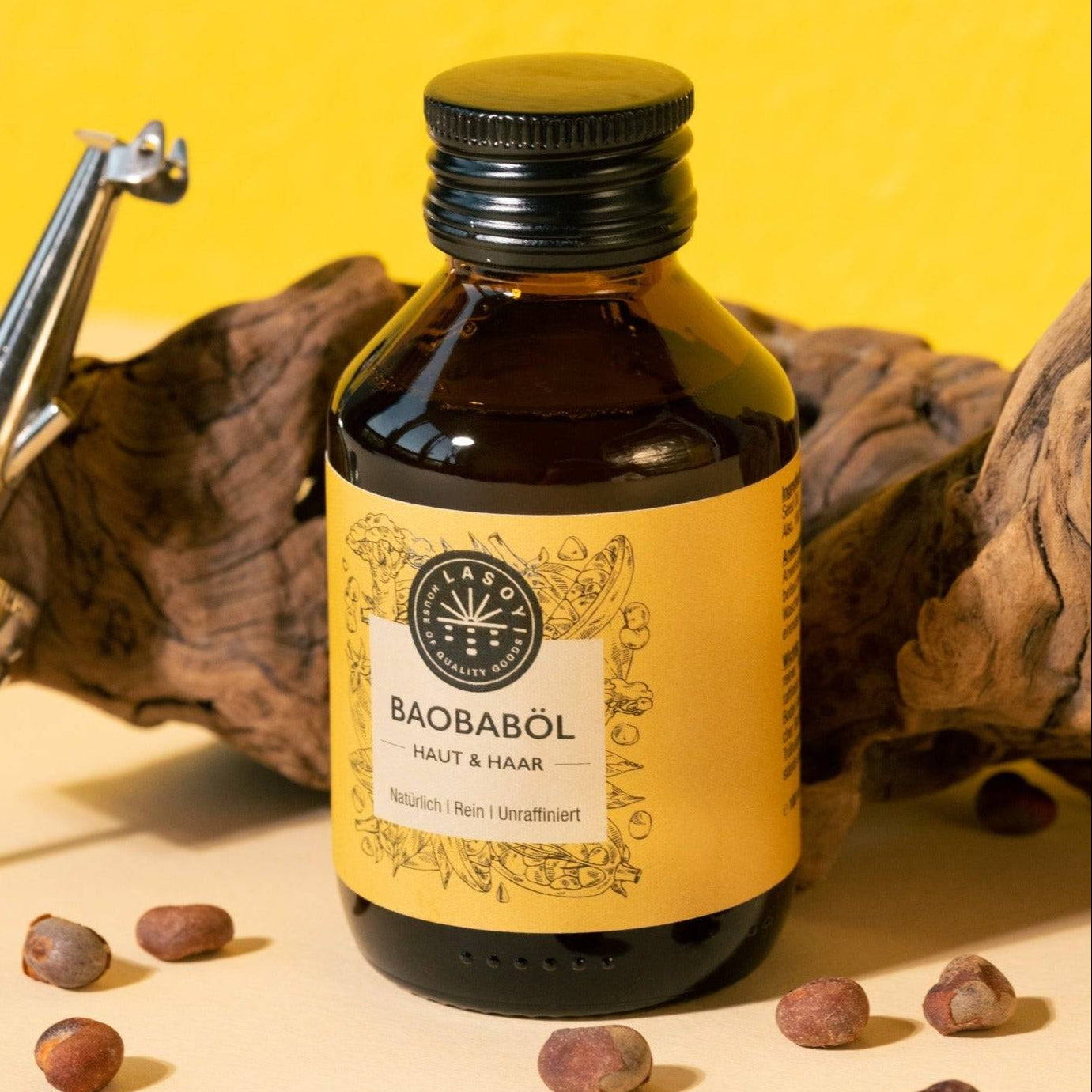 Kaltgepresstes Baobaböl in Braunglasflasche